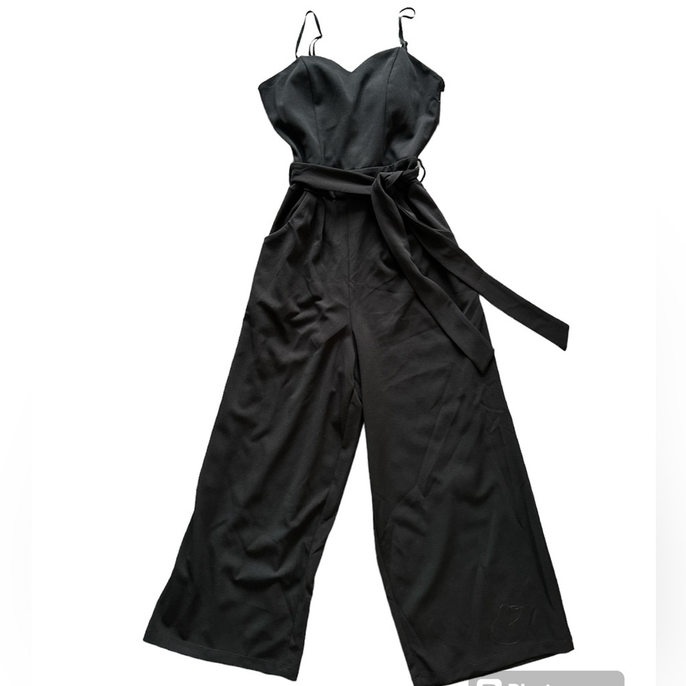 NWT Wide leg black jumpsuit with sweetheart neckline and tie waist.